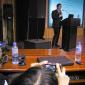 Zhuang Ying capturing Fang Hao as he speaks at his alma mater