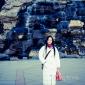 Melissa at a manmade waterfall in DaTang Paradise